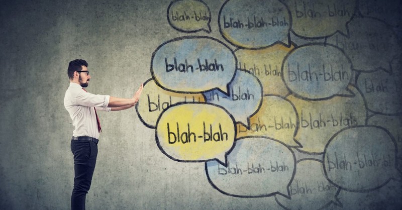 Man ignoring "blah" speech bubbles