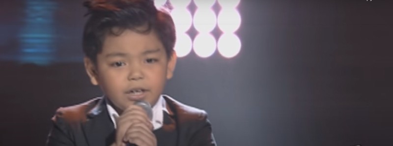 Young boy sings on The Voice