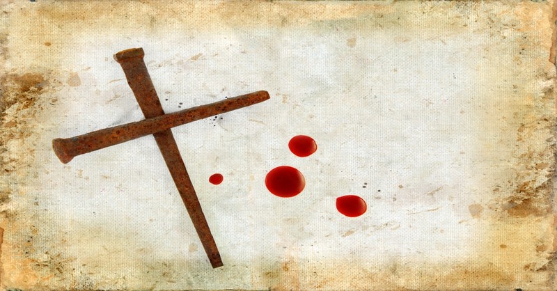 Rusty Nails Forming Cross drops of blood on grungy background, jesus on the cross