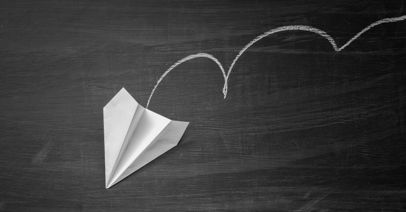Paper airplane crashing