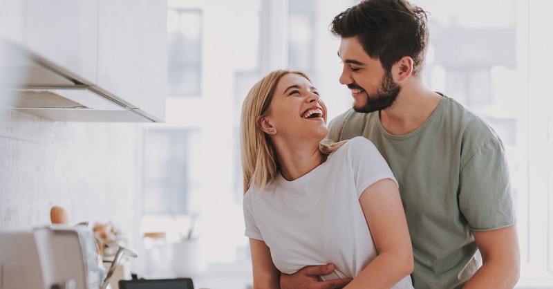 Happy couple in kitchen