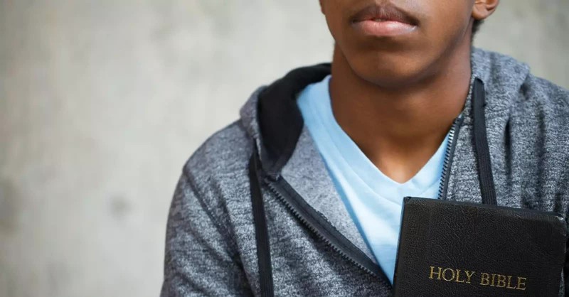 man reading bible, give thanks to the lord