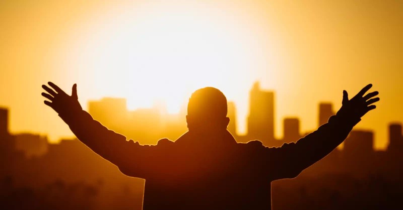 man worshipping outside, give thanks to the lord