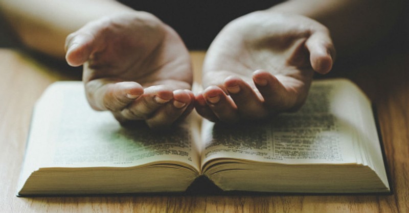 open hands over bible, change quiet time