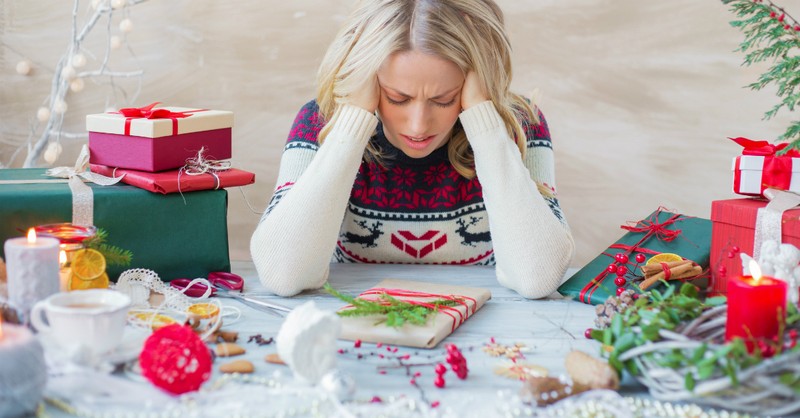 woman stressed over Christmas errands