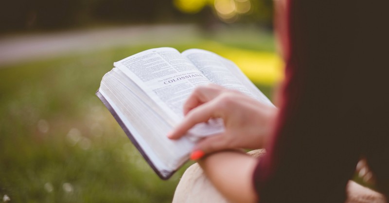 Woman reading the Bible