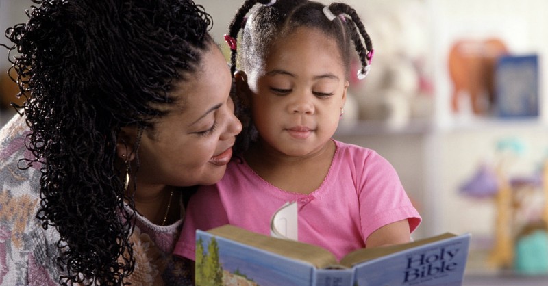 mom reading kids bible with daughter, revitalizing family devotions