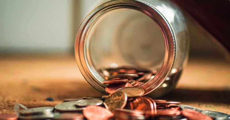 Jar of spilled coins