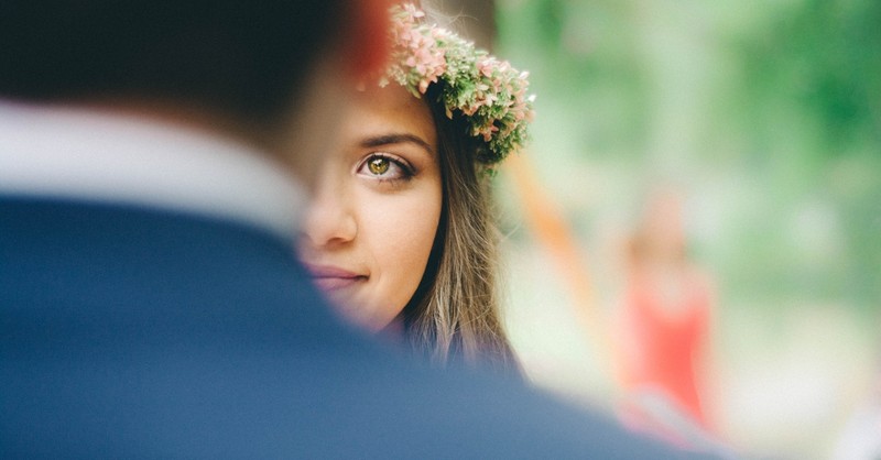 Young bride looking at her groom