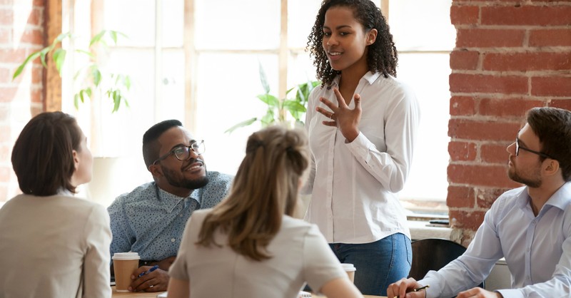 woman leading meeting at work