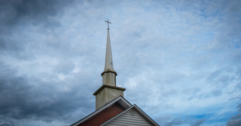 Church steeple with a cross on top