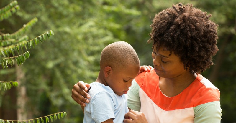 mom talking with young son