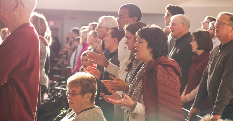 people worshiping in church