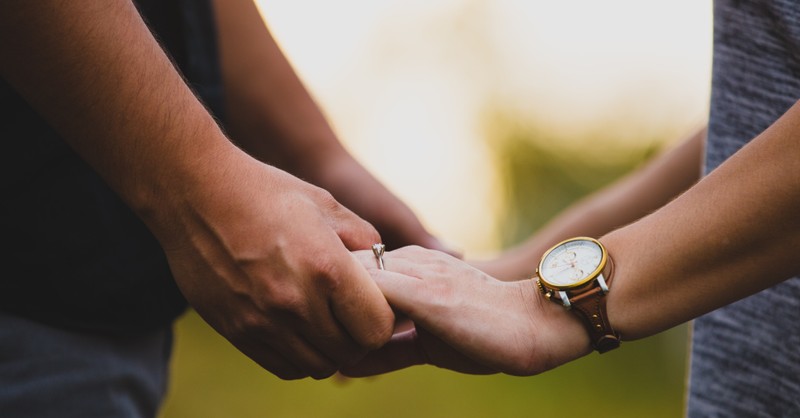 Couple holding hands