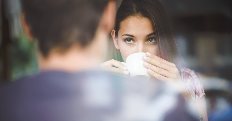 woman looking at man on a date, unequally yoked