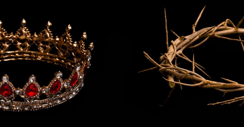 royal crown sitting next to Christ's' crown of thorns
