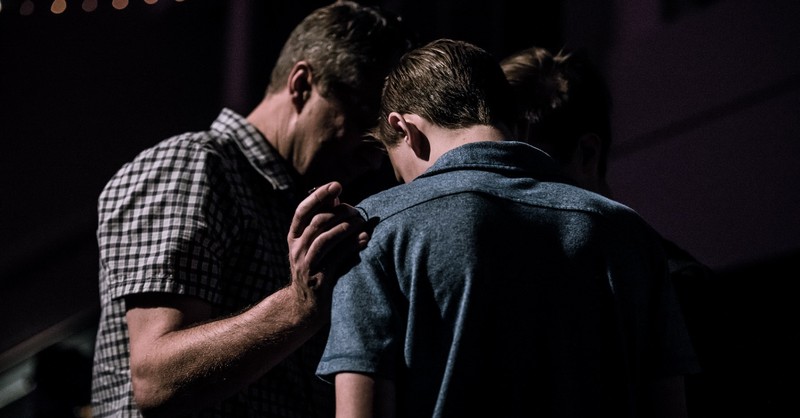 Two men praying