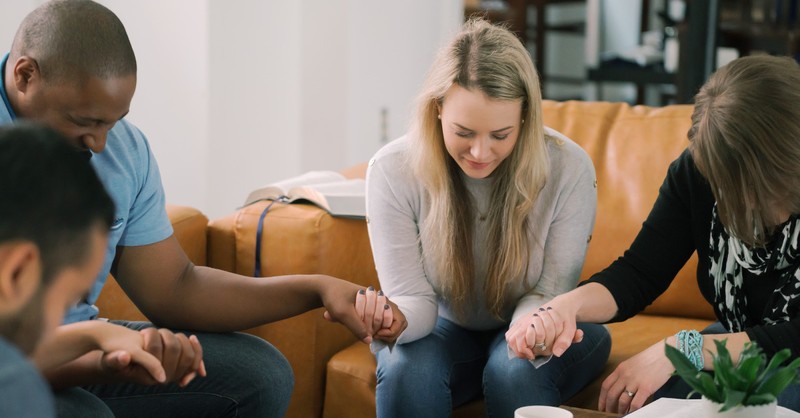 group praying together