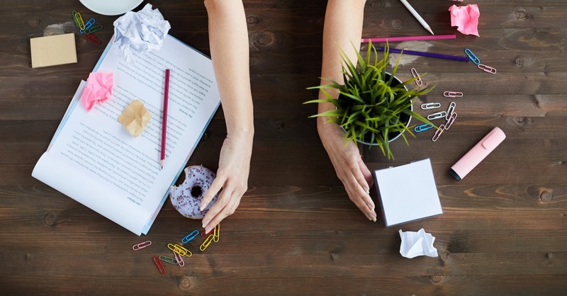 people decluttering desk