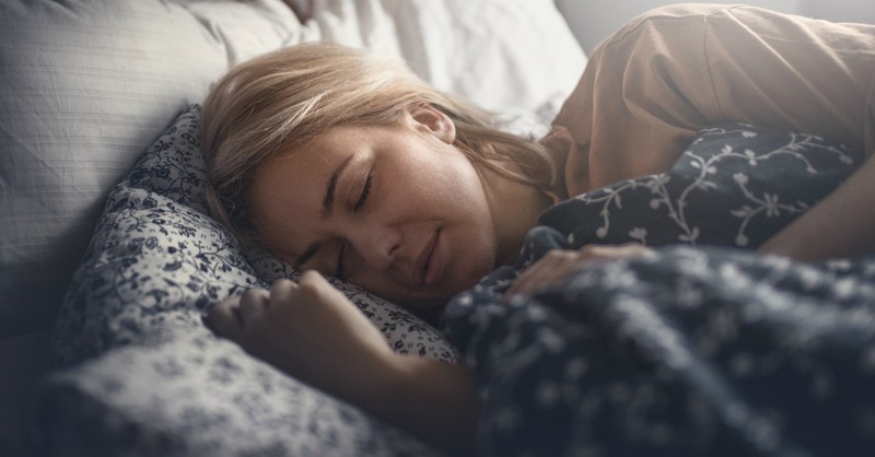 Woman asleep in bed