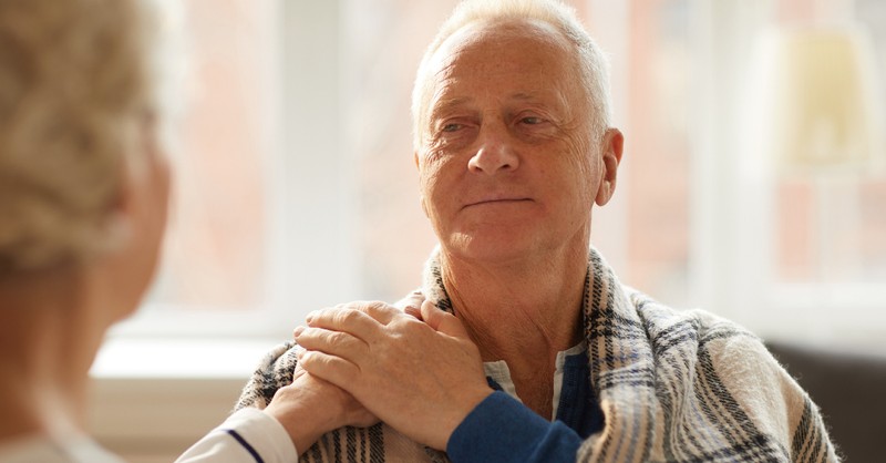 wife comforting husband, prayer intercession for spouse's health