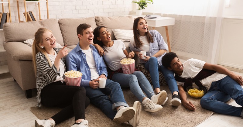 Teens watching a movie, great classic movies every Christian teen should watch