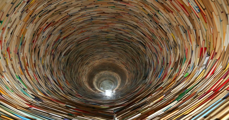 Endless spiral of books, god is great