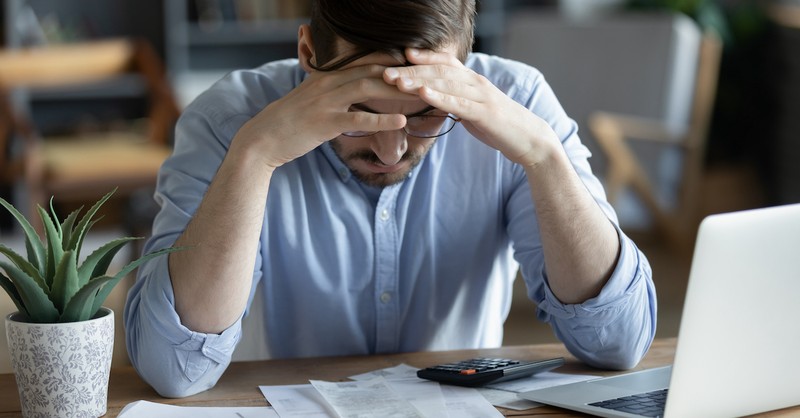 Man stressed over his budget, struggling with money