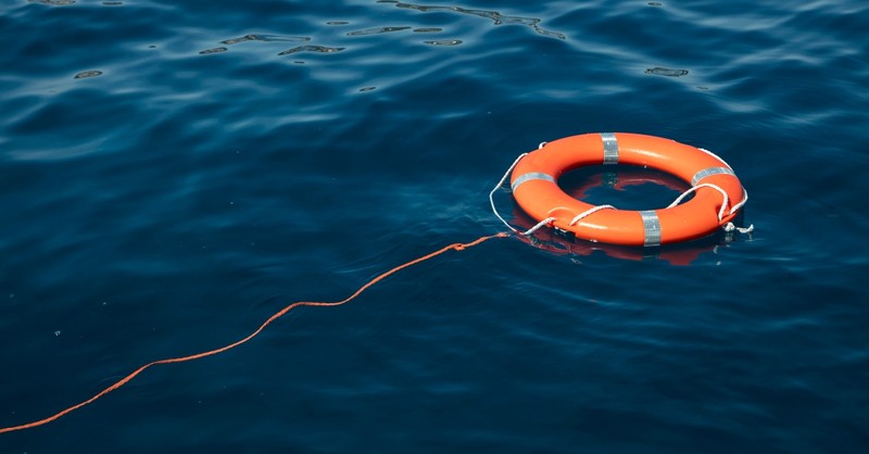 Life-saving ring floating in the ocean