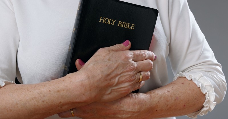 Woman holding her Bible