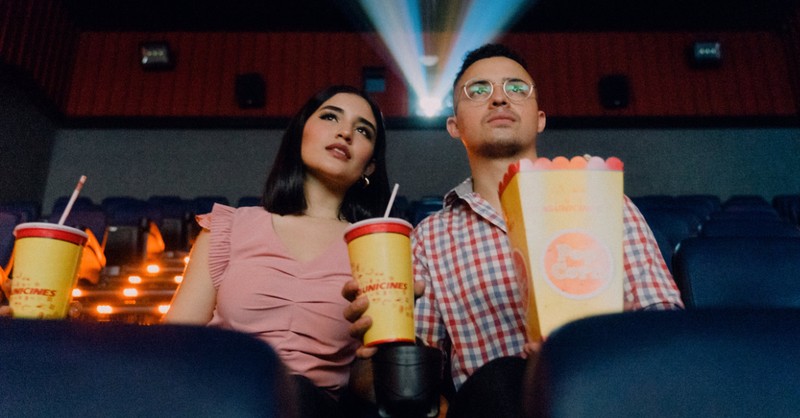 couple in a movie theater, R-rated movies are struggling in the theaters