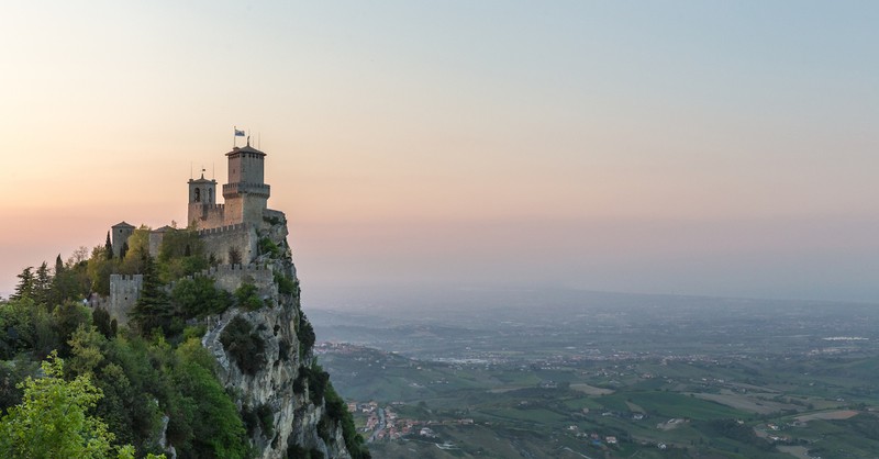 landscape view of a castle fortress at sunrise