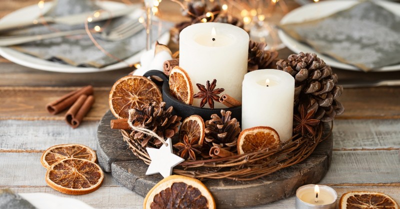Pine cones, candles, and dried oranges