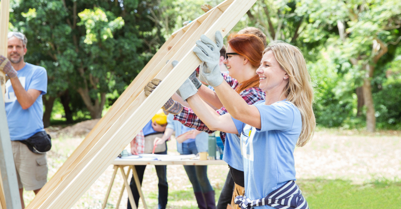 Volunteers building a home; gathering treasures in heaven.