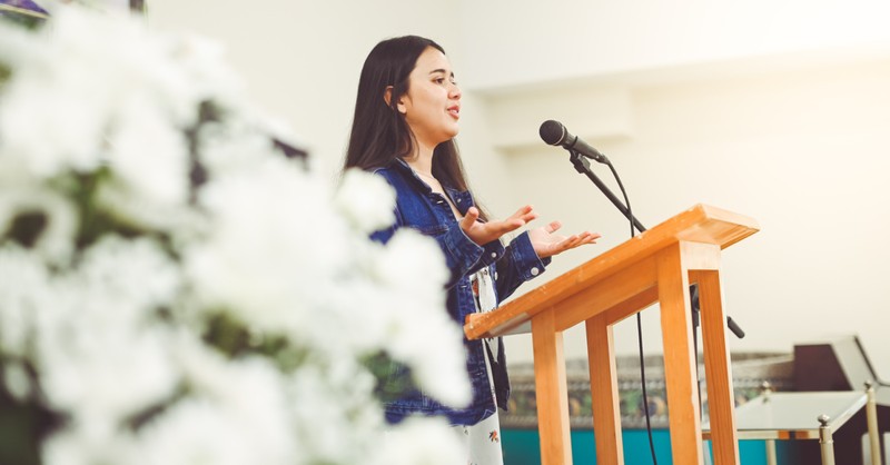 a woman at a podium, saddleback is expelled from the SBC over women pastors