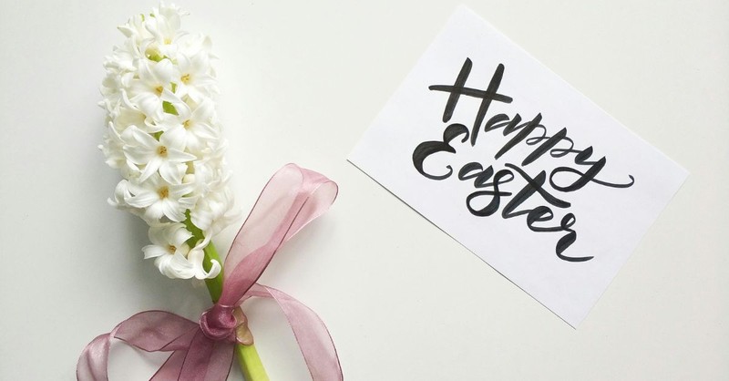 Flower and 'Happy Easter' sign; promises of Easter