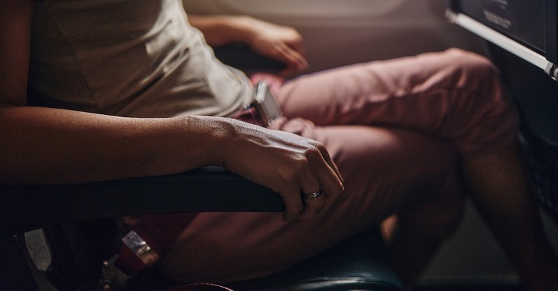 Anxious person on plane flying