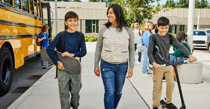 family walking to school together