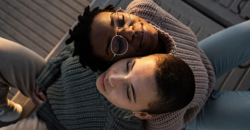 A person leaning fully on a friend’s shoulder