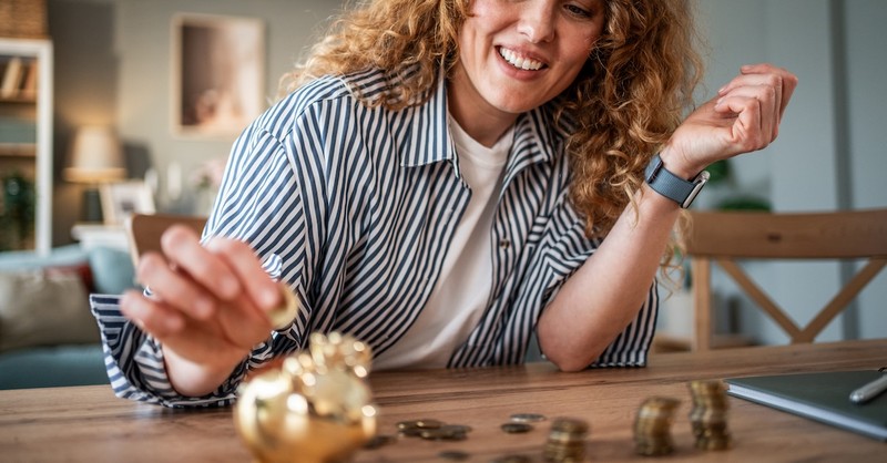 Grateful finances piggy bank woman budgeting money