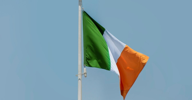 Irish flag hanging from a pole