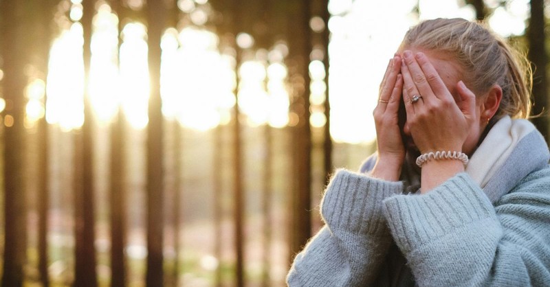 Woman Crying in Prayer | Finding God's Comfort in Difficult Times