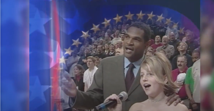 One Man Sings with Teen Who Froze During the Anthem 