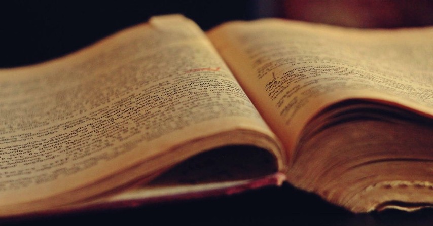 Old book or Bible open on table