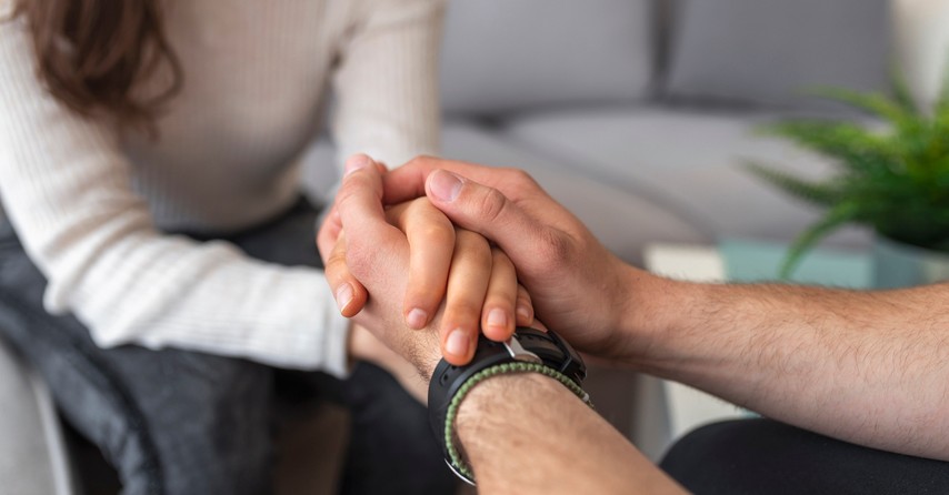 couple holding hands in prayer support forgiveness slow to anger