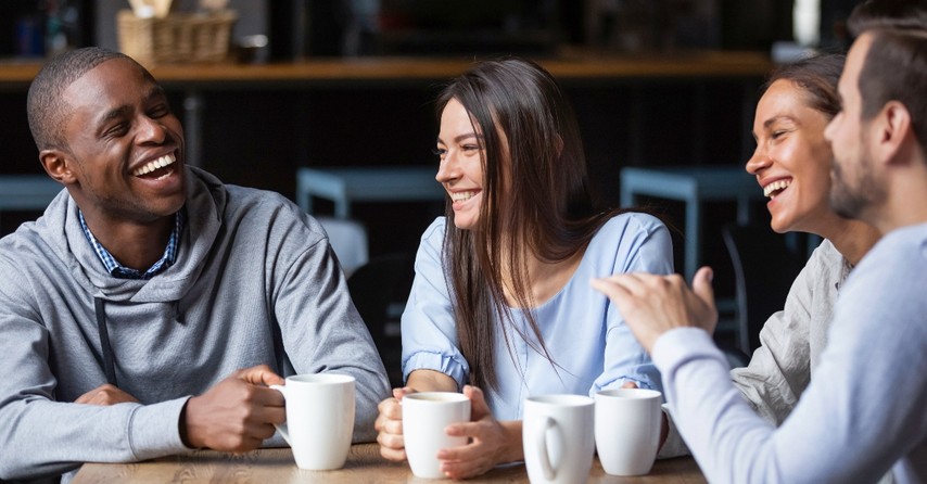 Group hanging out over coffee