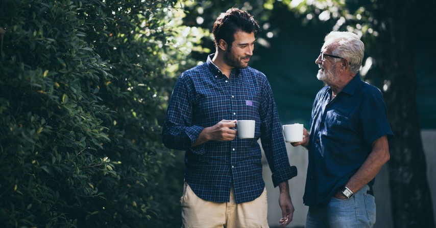 Two men talking to each other,