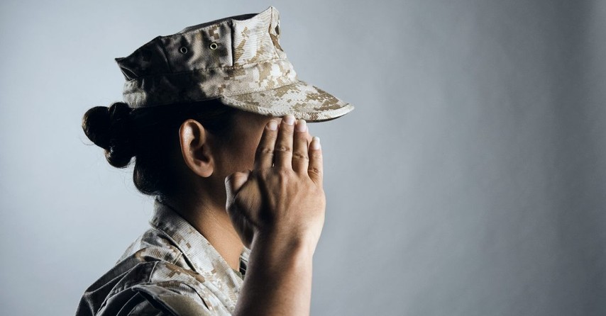 Female soldier saluting