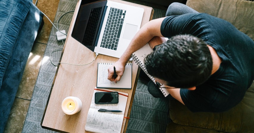 Person working hard at a laptop