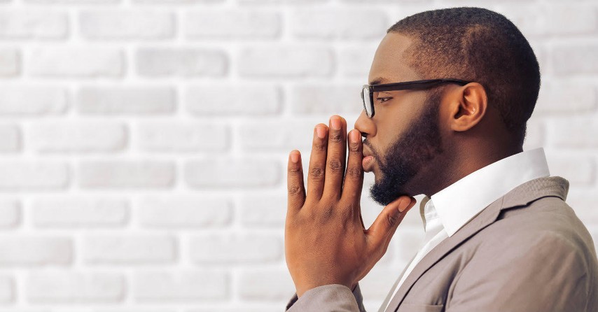 Profile of a man deep in thought